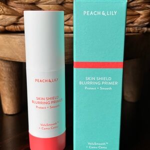 Peach & Lily Skin Shield Blurring Primer — White with Coral Accent